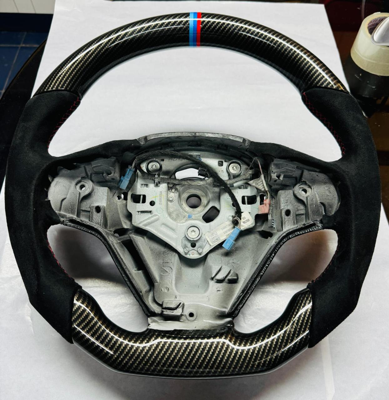 BMW M-Sport · Alcantara + Carbon Steering